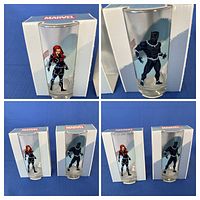 Both boxed glasses front view showing character graphics