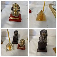 Collage showing all three items: gold Mask of Tut bust, acrylic pyramid pen holder, dark brown pharaoh bust