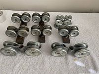 All nine roller assemblies laid out on towel