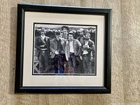 Front view of framed black-and-white photo print