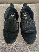 Top view of both shoes showing uppers and size