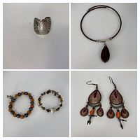 Group image showing choker, ring, two bracelets and pair of earrings