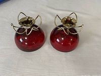 Both lucite candle holders front view