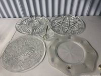 All five serveware pieces arranged on table
