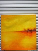 Full front view of square yellow and orange abstract painting