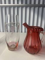 Both glass pieces side by side displaying color and design