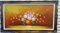 Full view of framed floral oil painting