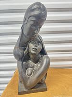 Front view of figural lovers sculpture
