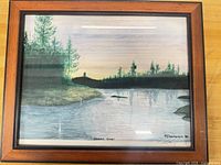 Full view of framed painting showing image, mat and wood frame