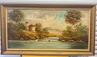 Full view of framed landscape oil painting