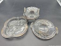group shot of three sterling silver overlay glass pieces