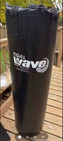 Full view of Tidal Wave Hydrocore punching bag standing upright