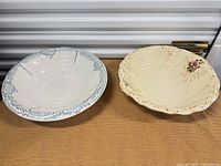 Top view of both bowls showing designs and interior surfaces