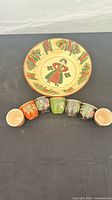 Top view of bowl with seven cups displayed