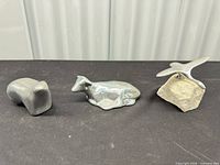 Front view of all three Hoselton aluminum sculptures