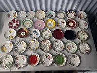 Overview of all saucers laid out in five rows