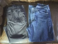 RDJ joggers (left) and blue jeans (right) laid flat