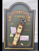 Front of plaque showing full raised relief design and text