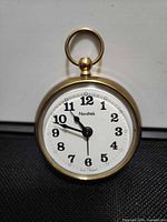 Front view showing Nordtek branding, white dial with black numerals and hands