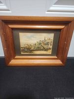 Front view of framed cityscape print