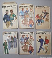 Six Butterick pattern envelopes laid out