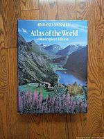 Front cover of Rand McNally Atlas of the World Masterpiece Edition