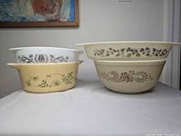 Group shot of four casseroles showing patterns and sizes