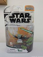 Front of sealed Star Wars Clone Wars Yoda action figure packaging