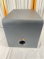 Front view of Klipsch ProMedia 5.1 subwoofer showing port and enclosure