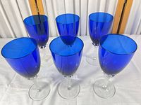 All six cobalt blue wine glasses front view