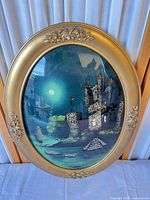 Full view of framed reverse glass painting