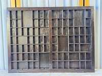 Full view of wooden grid display case front