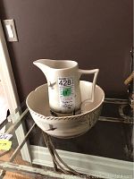 Pitcher inside basin showing overall set and design
