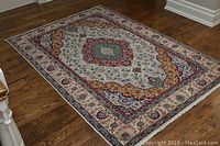 Full view of rectangular rug on hardwood floor