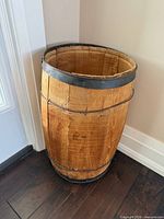 Full view of antique wooden barrel against wall