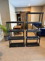 Front view of all three shelving units side by side