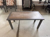 Full view of rectangular metal outdoor coffee table