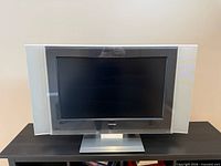 Front view of Toshiba 32HL83 television on stand