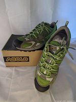 Side and top view of both shoes on Asolo box