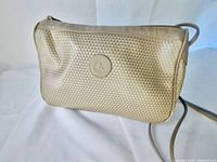 Front view showing overall design, texture and logo medallion