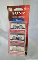 Front of sealed Sony 6-pack showing three twin-packs of MC-90 microcassettes