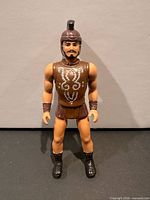 Front view of Thallo action figure standing upright