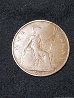 Reverse showing seated Britannia, denomination, date 1921