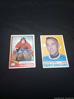 Front view of both hockey cards side by side