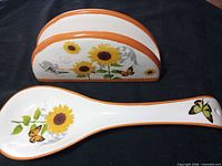 spoon rest and napkin holder front view showing design