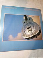 Front cover showing album art and edge wear