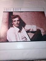 Front album cover showing artist portrait and title