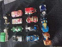Top view of all 12 die-cast cars arranged in rows