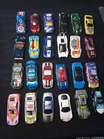 Full overhead view of 25 die-cast cars in five-by-five grid