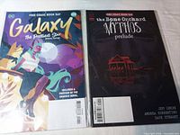 Both bagged comics side by side